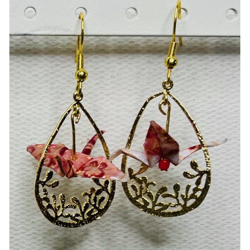 Boucles d'oreilles. Grue dans anneau fleuri - Rose